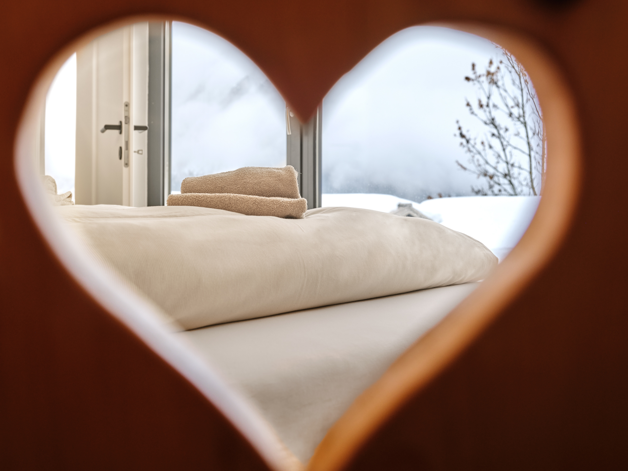 Snow through the shutter heart